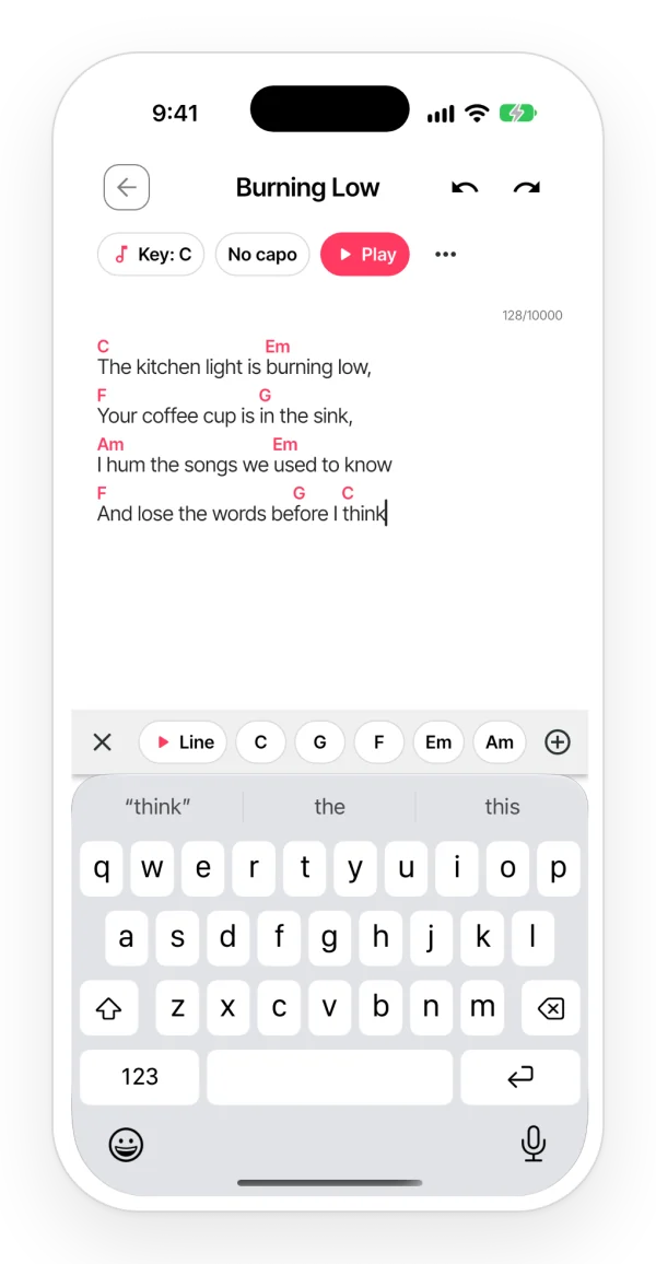 A lyric with chords above the words, the Key, Capo and Play header, and the chord bar above the keyboard.